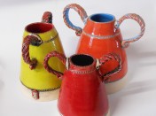 This is new work that I call "Indignant Sisters" jugs, mugs and vases, made from White Grogged Stoneware 157-4230 or White St Thomas 150-1106. They feature Barley Sugar twisted Handles, with bright complimentary colours. I can rely on Potclays clays to give me a uniform finish and colour.